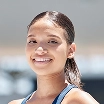 portrait woman and athlete on stadium running track